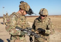 Sgt. Adam Rieger of B Co., 1st Battalion, 18th Infantry Regiment, 2nd Brigade Combat Team, 1st Infantry Division, assists a senior leader of the 1st Infantry Division with the Enhanced Night Vision Goggle-Binocular and Family of Weapon Site-Individual (FWS-I), during a Leadership Professional Development (LPD) session at Fort Riley, Kan., Dec. 11, 2019. The LPD offered a rare opportunity for senior leaders to receive a capability set brief on the U.S. Army’s most advanced night vision goggle, the ENVG-B, FWS-I, Nett Warrior, and Next Generation Improved Head Protection System, as well as an overview of PEO Soldier.
