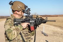 A senior leader of the 1st Infantry Division, fires an M4 rifle equipped with the Enhanced Night Vision Goggle-Binocular and Family of Weapon Site-Individual (FWS-I) capability set, during a Leadership Professional Development (LPD) session at Fort Riley, Kan., Dec. 11, 2019. The LPD offered a rare opportunity for senior leaders to receive a capability set brief on the U.S. Army’s most advanced night vision goggle, the ENVG-B, FWS-I, Nett Warrior, and Next Generation Improved Head Protection System, as well as an overview of PEO Soldier.