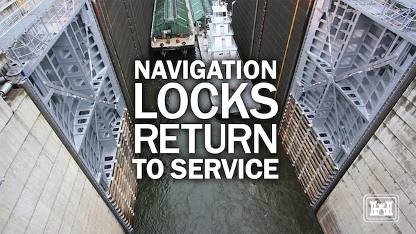 Navigation locks return to service. Barges exiting The Dalles Navigation Lock