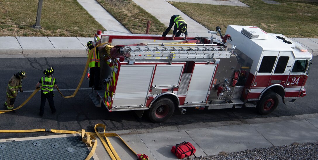 Firefighters conduct training exercise.