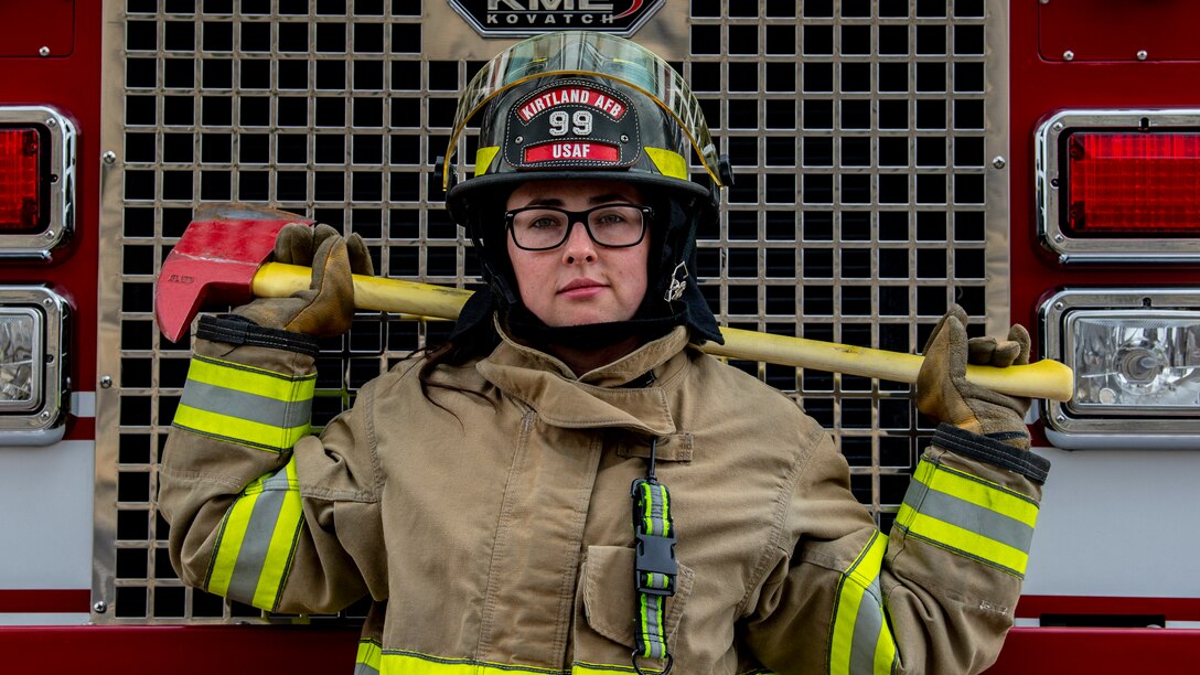 Firefighter poses.