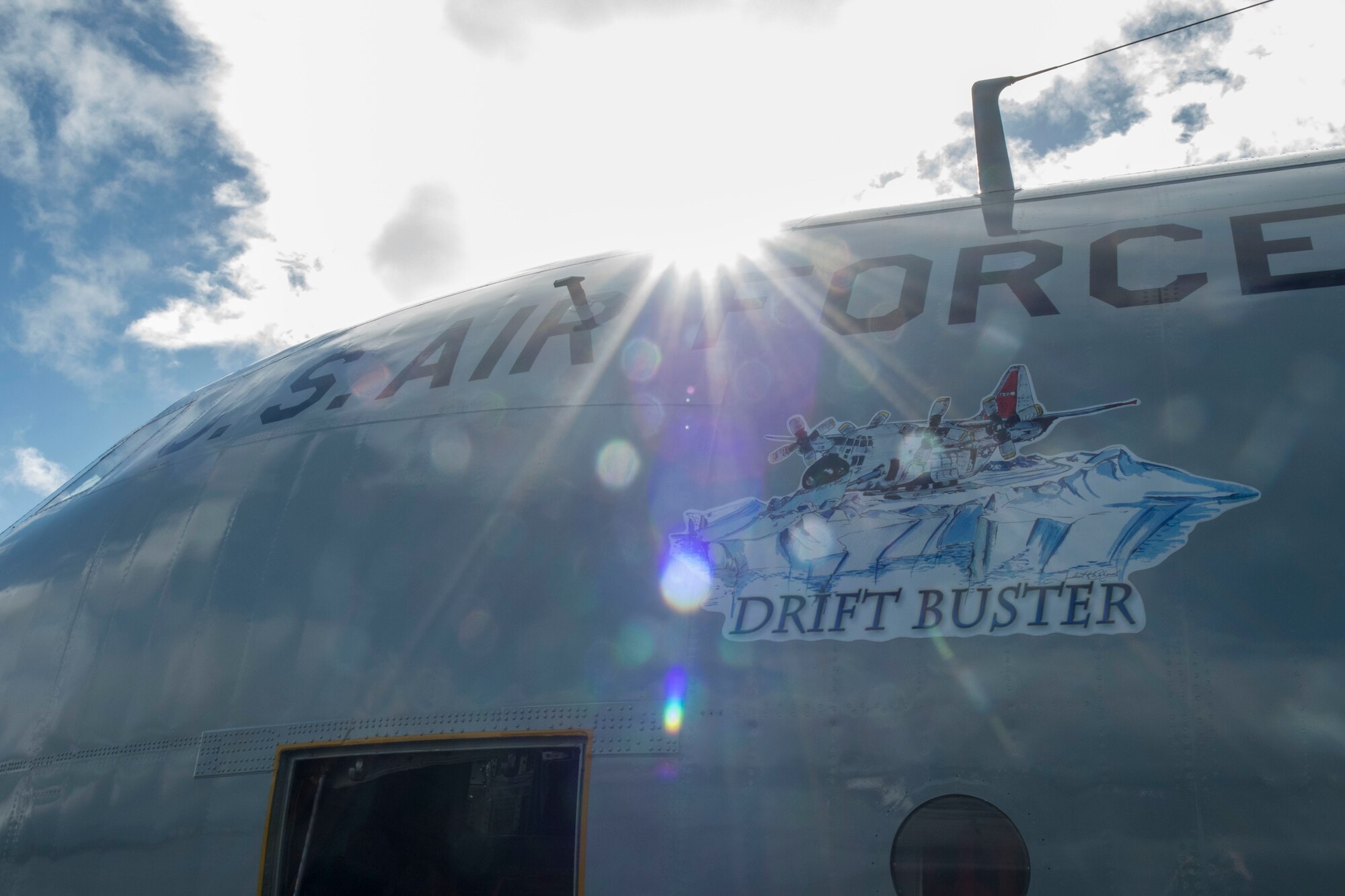 An LC-130 Hercules sits on the flightline at Joint Base Pearl Harbor-Hickam, Hawaii, March 6, 2020. The crew was supporting Operation DEEP FREEZE. The LC-130 four-engine turboprop transport aircraft is the backbone of U.S. Transportation within Antarctica and also provides air service between McMurdo Station, Antarctica and New Zealand. (U.S. Air Force photo by Staff Sgt. Mikaley Kline)