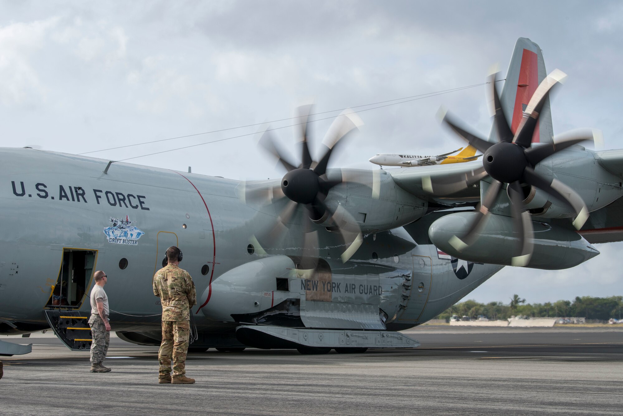 Airmen assigned to the 109th Airlift Wing, Stratton Air National Guard Base, New York, performs pre-flight inspections on an LC-130 Hercules on the flightline at Joint Base Pearl Harbor-Hickam, Hawaii, March 7, 2020. The crew was supporting Operation DEEP FREEZE. ODF is one of many operations in the Indo-Pacific in which the U.S. military promotes security and stability across the region. (U.S. Air Force photo by Staff Sgt. Mikaley Kline)