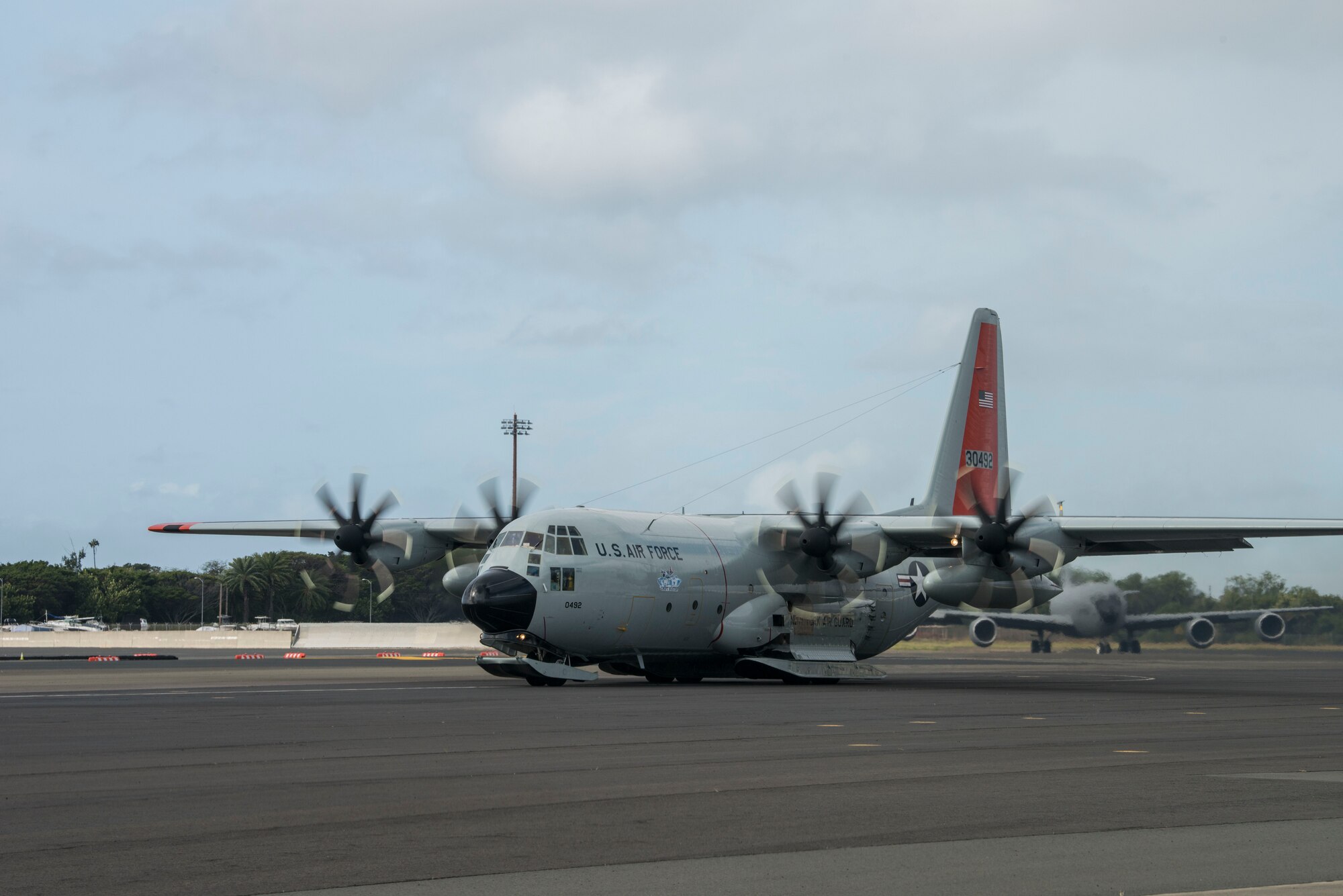 An LC-130 Hercules taxis on the flightline at Joint Base Pearl Harbor-Hickam, Hawaii, March 7, 2020. The crew was supporting Operation DEEP FREEZE. Pacific Air Forces operates on a 24-hour basis to provide the National Science Foundation complete joint operational and logistic support for ODF. (U.S. Air Force photo by Staff Sgt. Mikaley Kline)