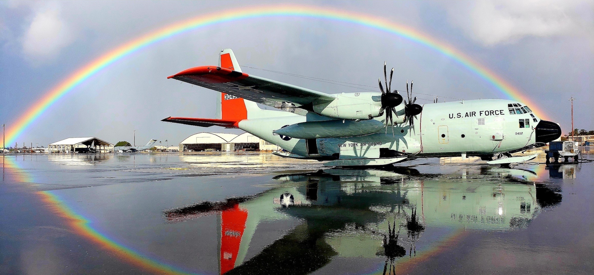 An LC-130 is parked on the flightline at Joint Base Pearl Harbor-Hickam, Hawaii, March 7, 2020. The crew was supporting Operation DEEP FREEZE. The LC-130 fleet supports a wide range of scientific research on climate change, global warming, ozone depletion, earth history, astronomy and environmental change. (U.S. Air Force photo by Master Sgt. Mike Hill/Courtesy Photo)