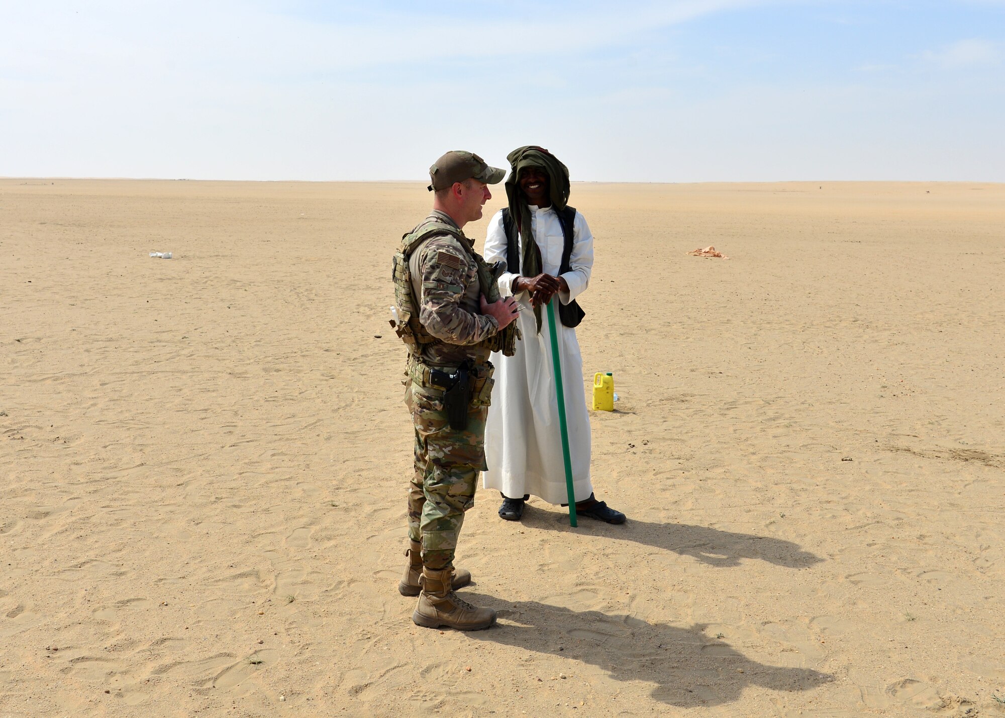 Airman interacts with Kuwait local