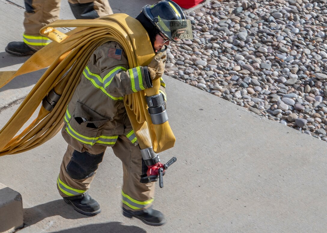 Firefighters conduct training exercise.