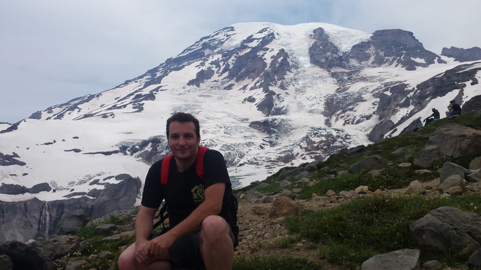 Man in front of mountain