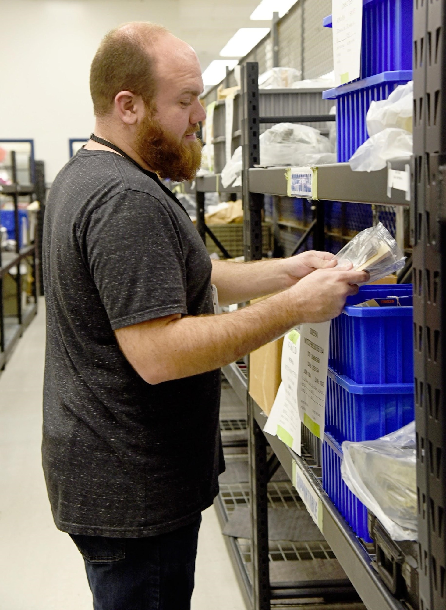 Gary Ball works in the kitting area of the 552nd Commodities Maintenance Constant Speed Drive Shop, processing over 1,000 components daily for the part. The CSD shop has undergone process improvements over the last few years to reduce backorders and excessive overhauls. (U.S. Air Force photo/Kelly White)