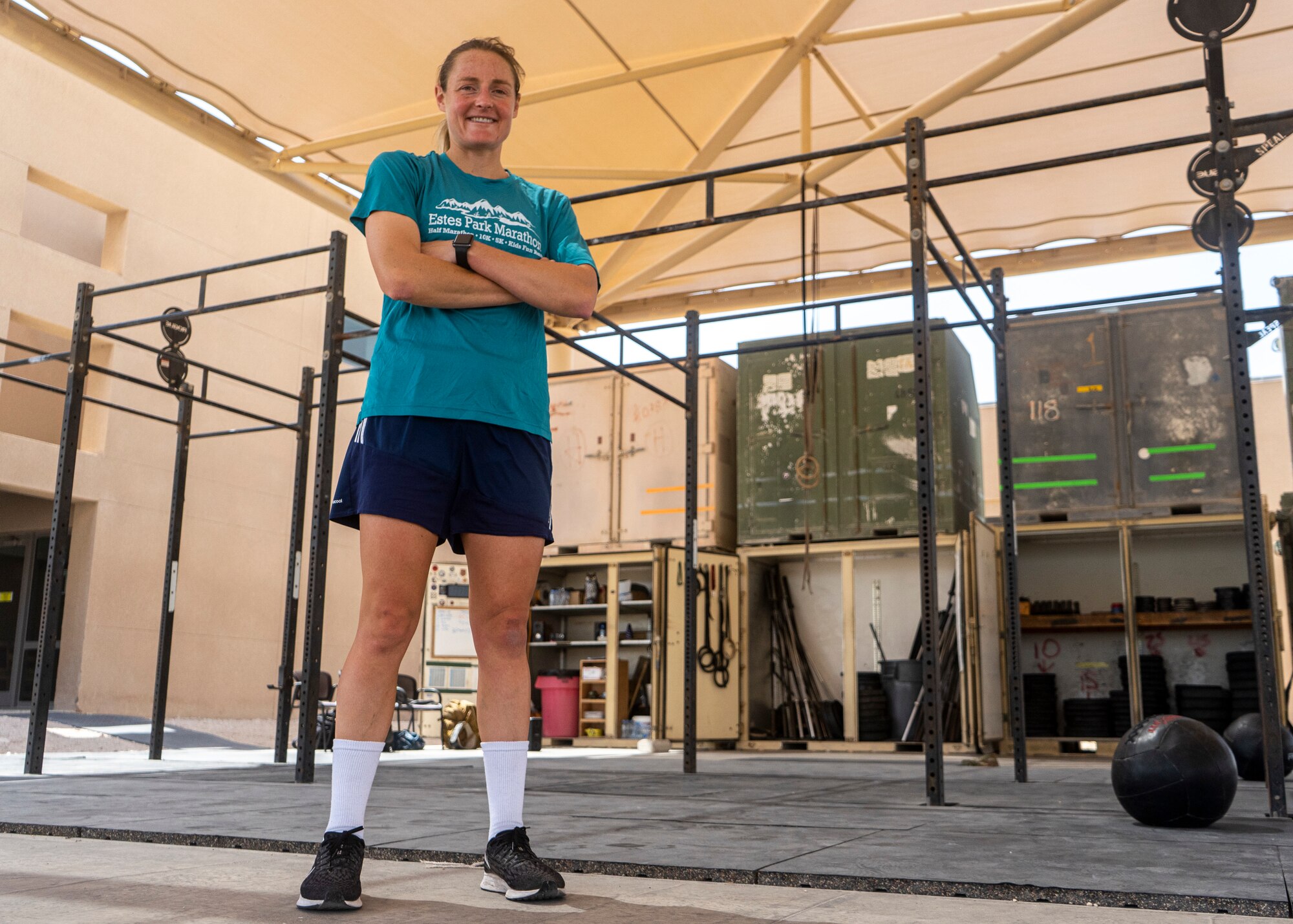 Capt. Alyson Gleason, Space Enhancement Officer, Director of Space Forces Staff, U.S. Air Forces Central Command, stands proud after her cross-fit workout at Al Udeid Air Base, Qatar on March 10, 2020. Gleason trains regularly to maintain her athletic standards. (U.S. Air Force photo by Senior Airman Olivia Grooms)