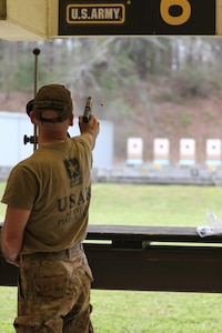 Sgt. 1st Class Rosendorn fires during the Precision Pistol phase at All Army, one of the many competitive formats used at the event, which also included combat rifle, combat pistol, and action shooting courses.