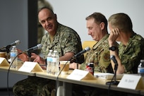 From left, U.S. Navy Adm. Charles Richard, commander of U.S. Strategic Command (USSTRATCOM), U.S. Air Force Maj. Gen. Clinton Crosier, director of space force planning at the office of the Chief of Space Operations, and U.S. Navy Rear Adm. Richard Correll, USSTRATCOM director of plans and policy, participate in a tabletop exercise during the 2020 Deterrence and Assurance Academic Alliance Conference at Iowa State University in Ames, Iowa, March 12, 2020. Over 100 participants engaged in a four-hour USSTRATCOM-led wargame designed to apply students’ knowledge of U.S. instruments of national power, as they developed solutions to a simulated crisis strategic decision-making scenario.
