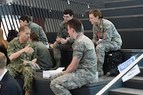 U.S. Navy Rear Adm. Richard Correll, U.S. Strategic Command (USSTRATCOM) director of plans and policy, has lunch with Iowa State University (ISU) cadets during the 2020 Deterrence and Assurance Academic Alliance Conference at ISU in Ames, Iowa, March 12, 2020. Over 100 participants engaged in a four-hour USSTRATCOM-led wargame designed to apply students’ knowledge of U.S. instruments of national power, as they developed solutions to a simulated crisis strategic decision-making scenario.