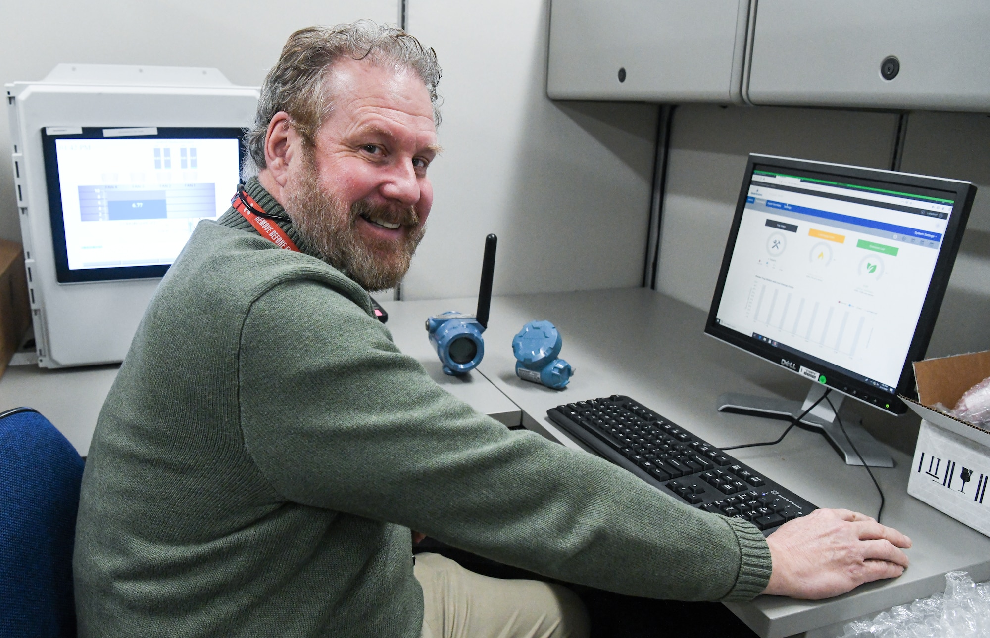 Brent Morris, an AEDC Instrumentation, Data and Controls reliability engineer, demonstrates the software interface for the instrumentation on the Condition-Based Maintenance (CBM) Wireless Network, Feb. 11, 2020, at Arnold Air Force Base, Tenn. The CBM Wireless Network has been installed in a limited capacity as a pilot project. (U.S. Air Force photo by Jill Pickett)