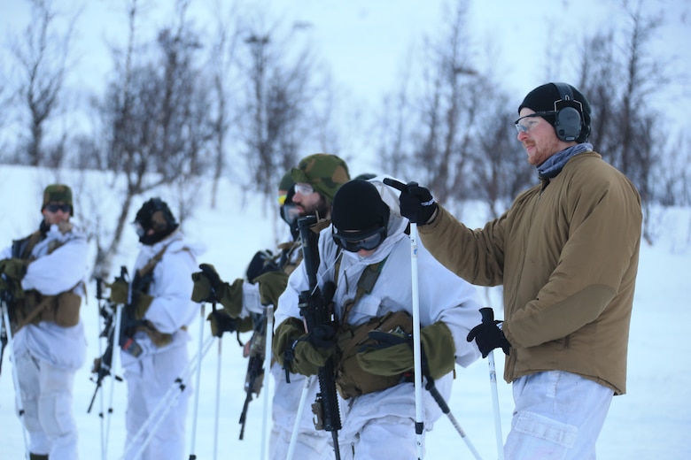 U.S. Marine Sgt. Mitch Nordskog, a Reconnaissance Marine with Force Reconnaissance Company, 2nd Reconnaissance Battalion, 2nd Marine Division, and the American instructor for the Norwegian Military’s Long Range Reconnaissance Patrol course, instructs Marines during the LRRP in Norway, Feb. 22, 2020. The Marines are conducting the LRRP to strengthen the interoperability, mobility, expeditionary readiness and warfighting excellence of FORECON and the Norwegian Military. (U.S. Marine Corps photo by Cpl. Aaron Douds)