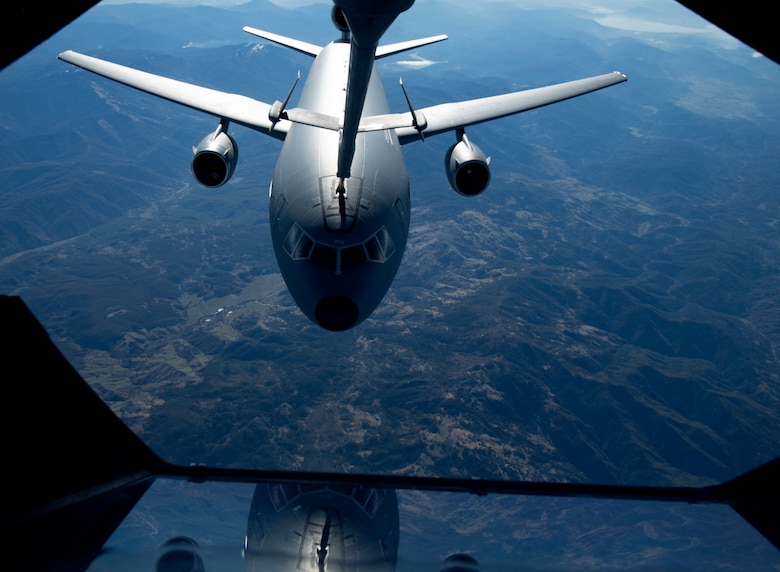 The boom of a KC-10 Extender, flown by the 6th Air Refueling Squadron, makes dry contact with another KC-10 over Oregon, March 12, 2020. Making contact without offloading fuel is referred to as a 