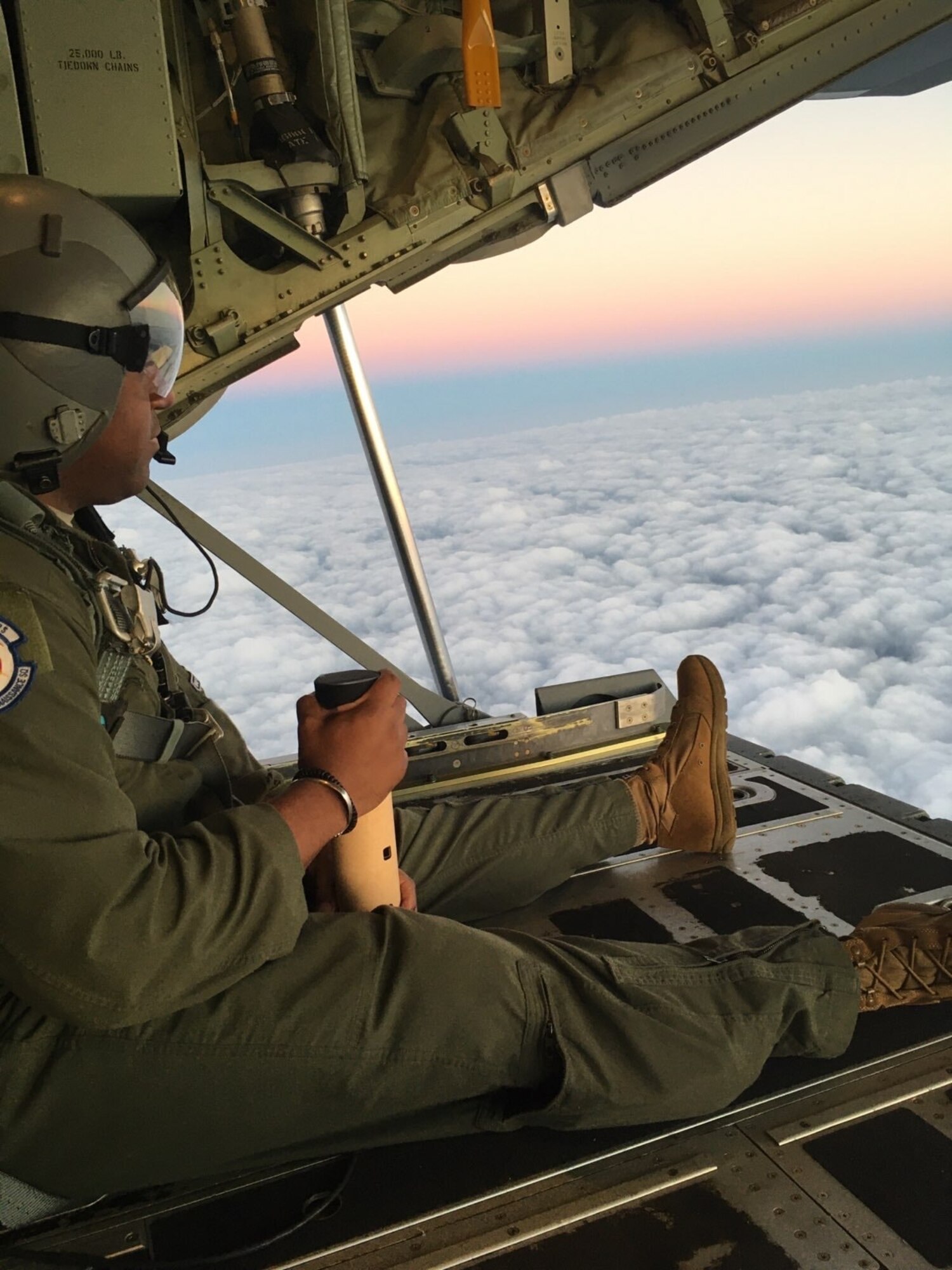 Tech. Sgt. Larry Banks, 53rd Weather Reconnaissance Squadron loadmaster, prepares to drop a simulated buoy from a WC-130J Super Hercules aircraft March 19, 2020, off the Gulf Coast of Mexico. The Hurricane Hunters train all year to maintain readiness. (U.S. Air Force photo by Tech. Sgt. Larry Banks)