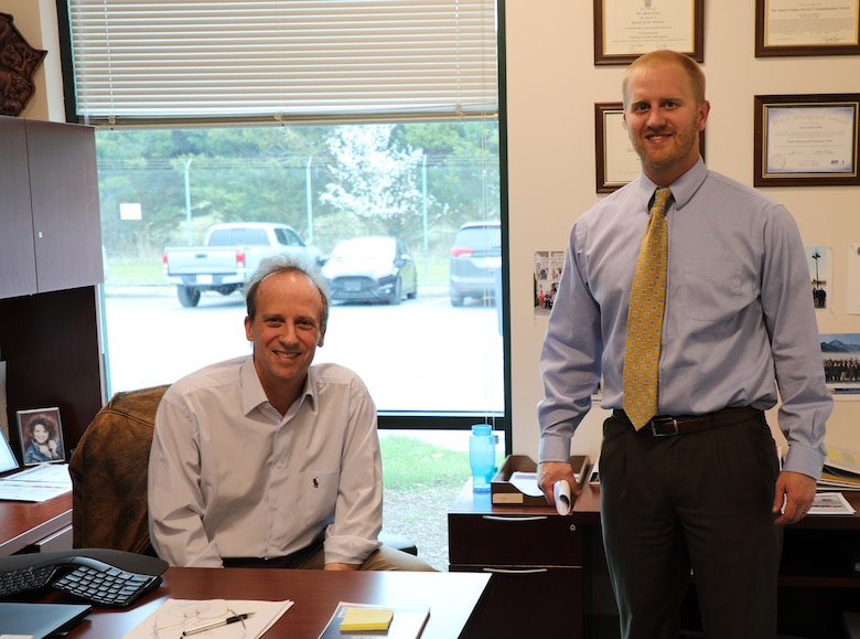 Joey Behr, a Program Manager in the Business Integration Division (right) visits with his boss, Scott Cilley at the Transatlantic Division's headquarters in Winchester, Va. Behr was named the Transatlantic Division’s Employee of the Quarter for October-December 2019 during All-Hands Town Hall held across the globe on March 19, 2020. Employees from inside the U.S. and from a dozen countries in the Middle East attended the Town Hall telephonically in response to the COVID-19 pandemic.