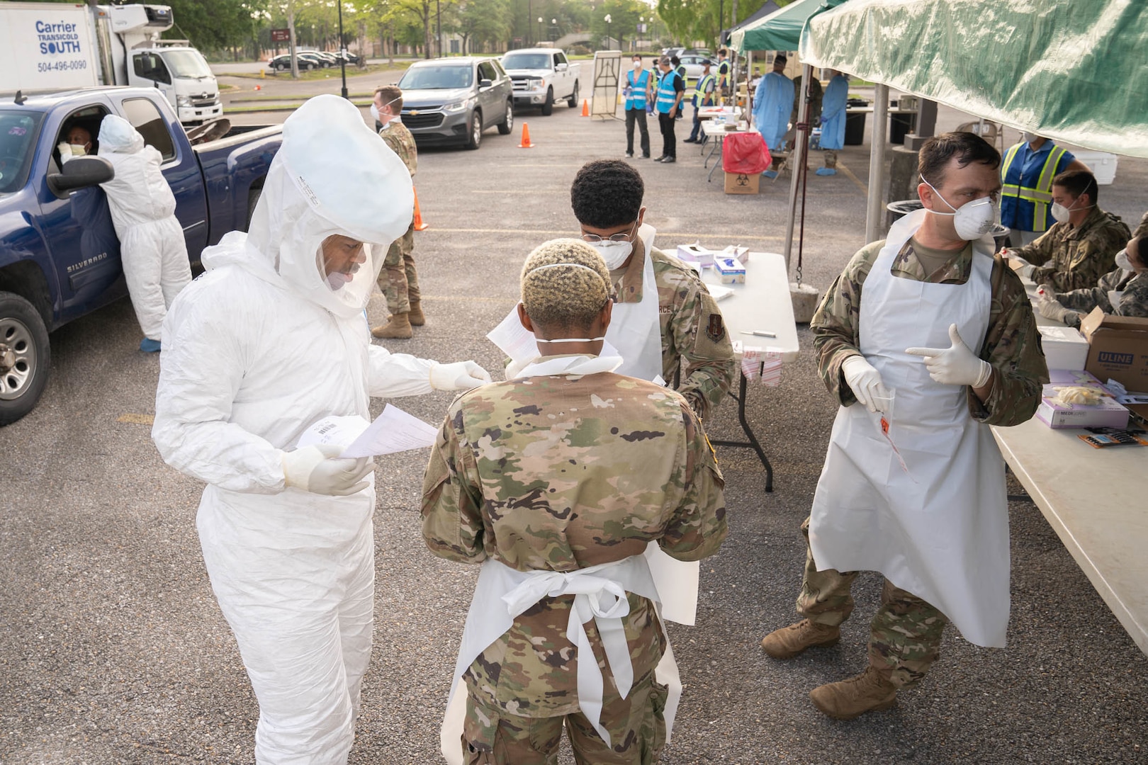 Louisiana National Guard Soldiers and Airmen test first responders for COVID-19 infections at Louis Armstrong Park, New Orleans, Louisiana, March 20, 2020. The testing site is one of three across New Orleans and Jefferson Parishes and will soon open to the general public.