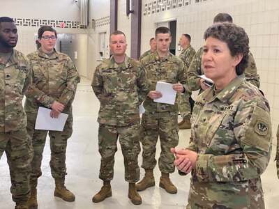 Brig. Gen. Joane Mathews, Wisconsin’s deputy adjutant general for Army, speaks March 12, 2020, to troops mobilizing for state active duty in response to the Wisconsin Department of Health Service’s request for assistance. Approximately 300 troops have been mobilized to state active duty to posture the Guard for state support if needed.