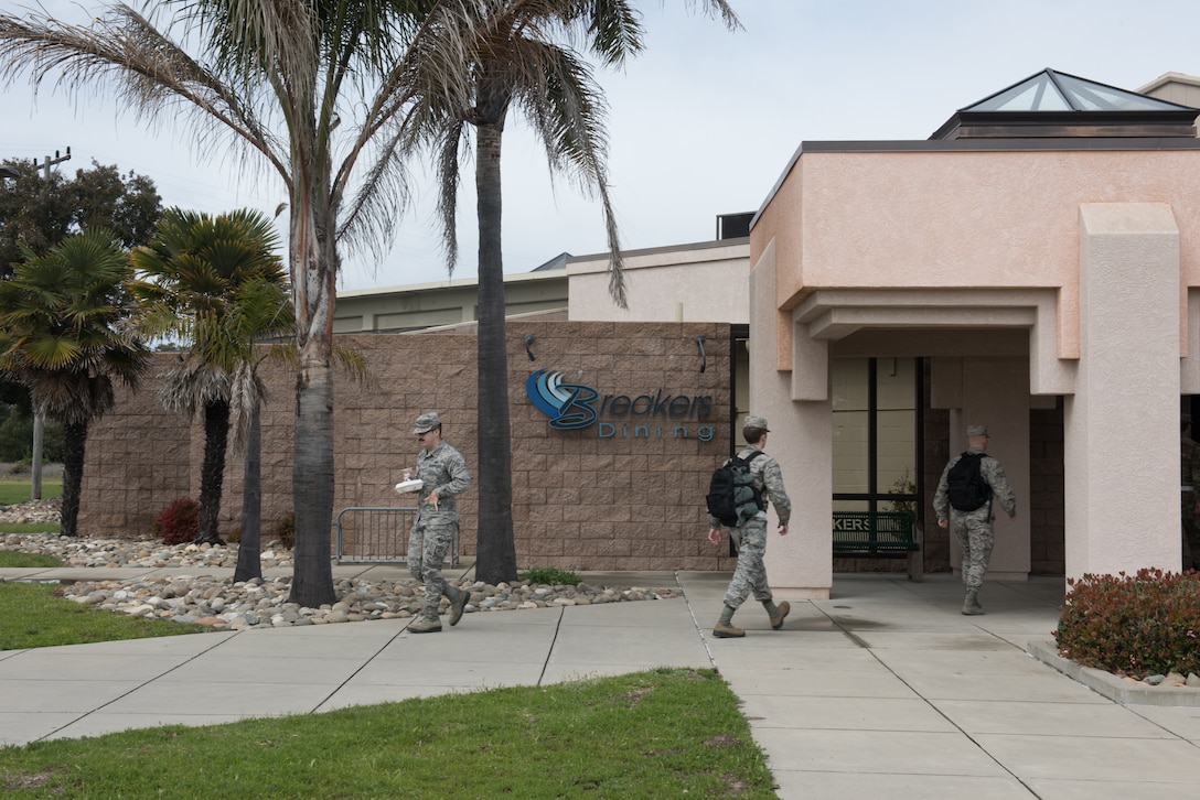 Photo of airmen walking to and from dining facility.