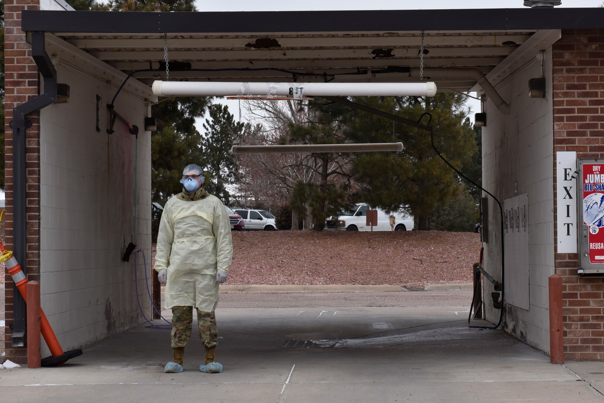 Peterson Air Force Base, Colorado medical professionals established a COVID-19 testing location at the car wash, March 20, 2020 to help limit the possible spread of the virus. The consolidation of patients to this area will help minimize the exposure to COVID-19. If there is concern that you or someone in your family has been exposed to COVID-19, please call (719) 524-2273 first to obtain an appointment. Without an appointment, individuals will be turned away at the test location.  (Air Force photo by Airman 1st Class Alexis Christian)