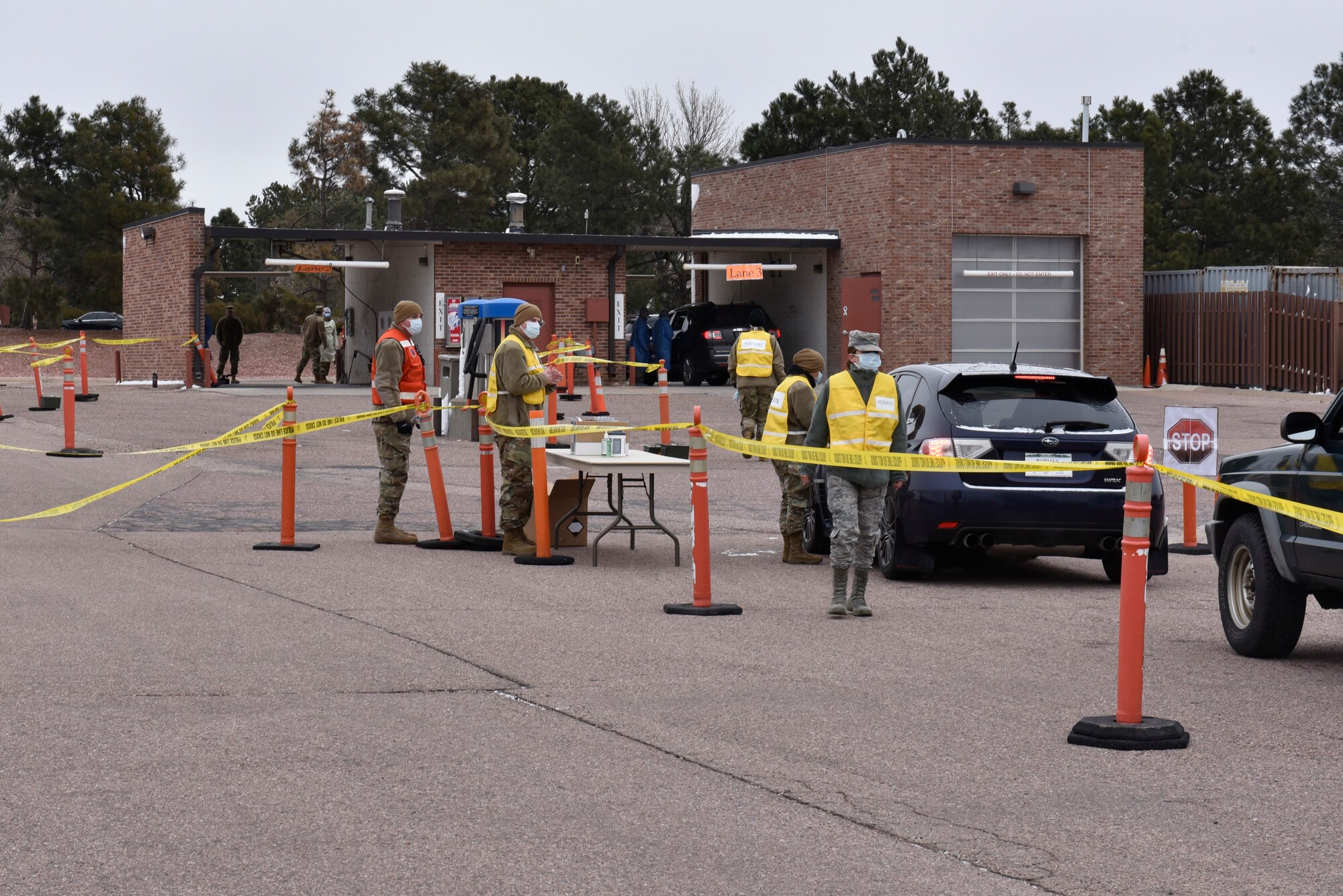 Medical professionals at Peterson Air Force Base, Colorado, established a COVID-19 test location at the car wash to help limit the possible spread of the virus, March 20, 2020. The consolidation of patients to this area will help minimize the exposure to COVID-19. The center is open by appointment only. (Air Force photo by Airman 1st Class Alexis Christian)