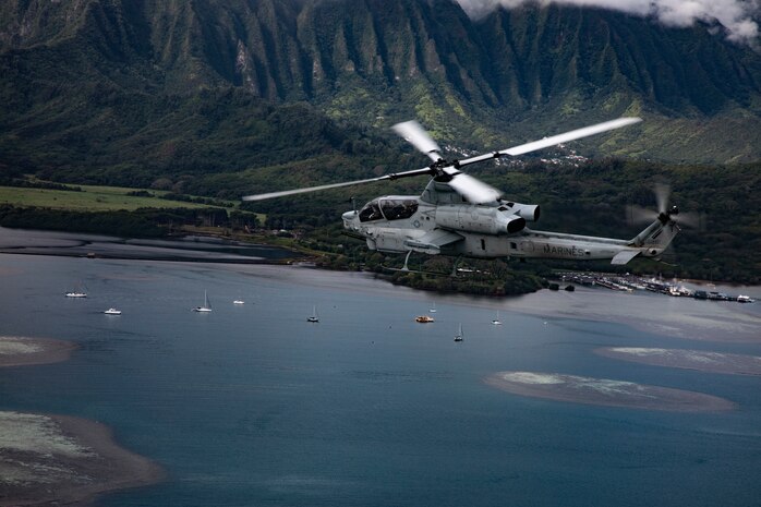 A U.S. Marine Corps AH-1Z Viper helicopter with Marine Light Attack Helicopter Squadron 367, Marine Aircraft Group 24, flies from Marine Corps Air Station Kaneohe Bay to Joint Base Pearl Harbor-Hickam, Hawaii, March 13, 2020.