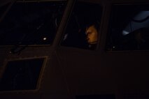 Capt. Tom Swinchoski, 39th Airlift Squadron pilot assigned to Dyess Air Force Base, Tx., performs post-flight checks at Joint Base Charleston, S.C., March 20, 2020.