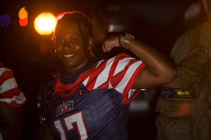 A member of the U.S. women’s football team poses after her flight at Joint Base Charleston, S.C., March 20, 2020.