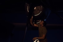 Senior Airman Tanner Huff, 39th Airlift Squadron loadmaster assigned to Dyess Air Force Base, Tx., performs post-flight checks on a C-130 Hercules at Joint Base Charleston, S.C., March 20, 2020.