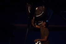 Senior Airman Tanner Huff, 39th Airlift Squadron loadmaster assigned to Dyess Air Force Base, Tx., performs post-flight checks on a C-130 Hercules at Joint Base Charleston, S.C., March 20, 2020.