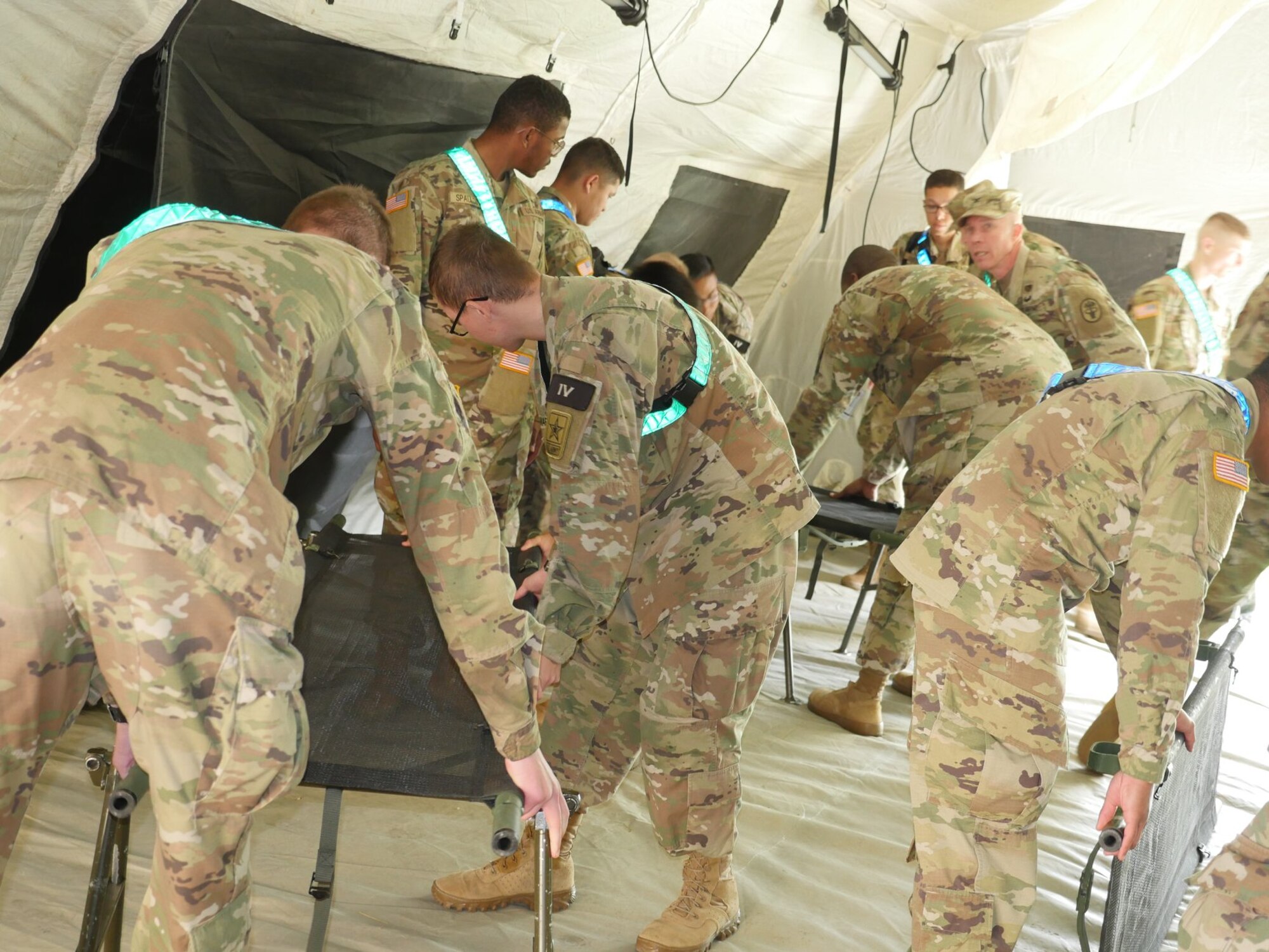 Soldiers set up tent