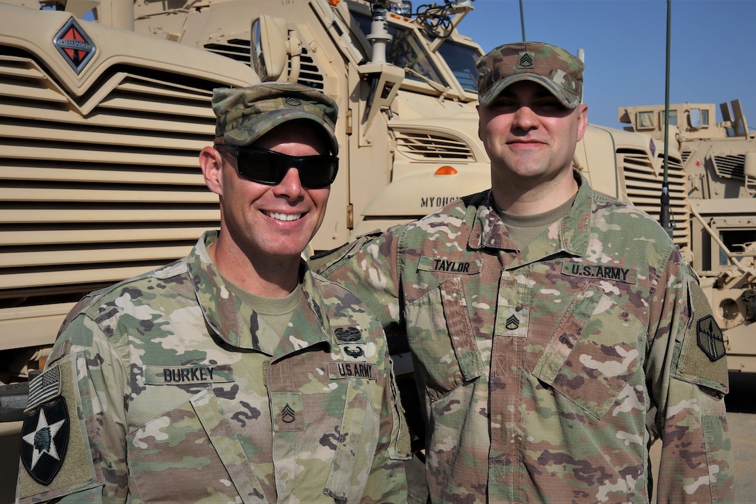 From left, Staff Sgt. Daniel Burkey of the 1st Squadron, 303rd Cavalry Regiment, Washington National Guard, and Staff Sgt. Zachary Taylor of the 301st Maneuver Enhancement Brigade. This month, the 301st MEB joined the 1-303rd Cavalry, which has been in Jordan since November, uniting the Soldiers who happen to be brothers-in-law.