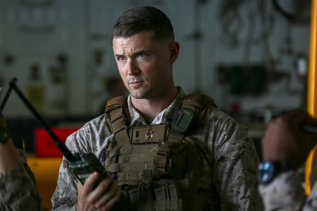 200316-M-IR130-1004 RED SEA (March 16, 2020) 1st Lt. Joseph Lockard, a platoon commander assigned to Fox Company, Battalion Landing Team, 2nd Battalion, 8th Marine Regiment, 26th Marine Expeditionary Unit (MEU), conducts radio checks aboard the amphibious assault ship USS Bataan (LHD 5) March 16, 2020. Bataan, with embarked 26th MEU, is deployed to the U.S. 5th Fleet area of operations in support of naval operations to ensure maritime stability and security in the Central Region, connecting the Mediterranean and Pacific through the Western Indian Ocean and three strategic choke points. (U.S. Marine Corps photo by Cpl. Gary Jayne III)