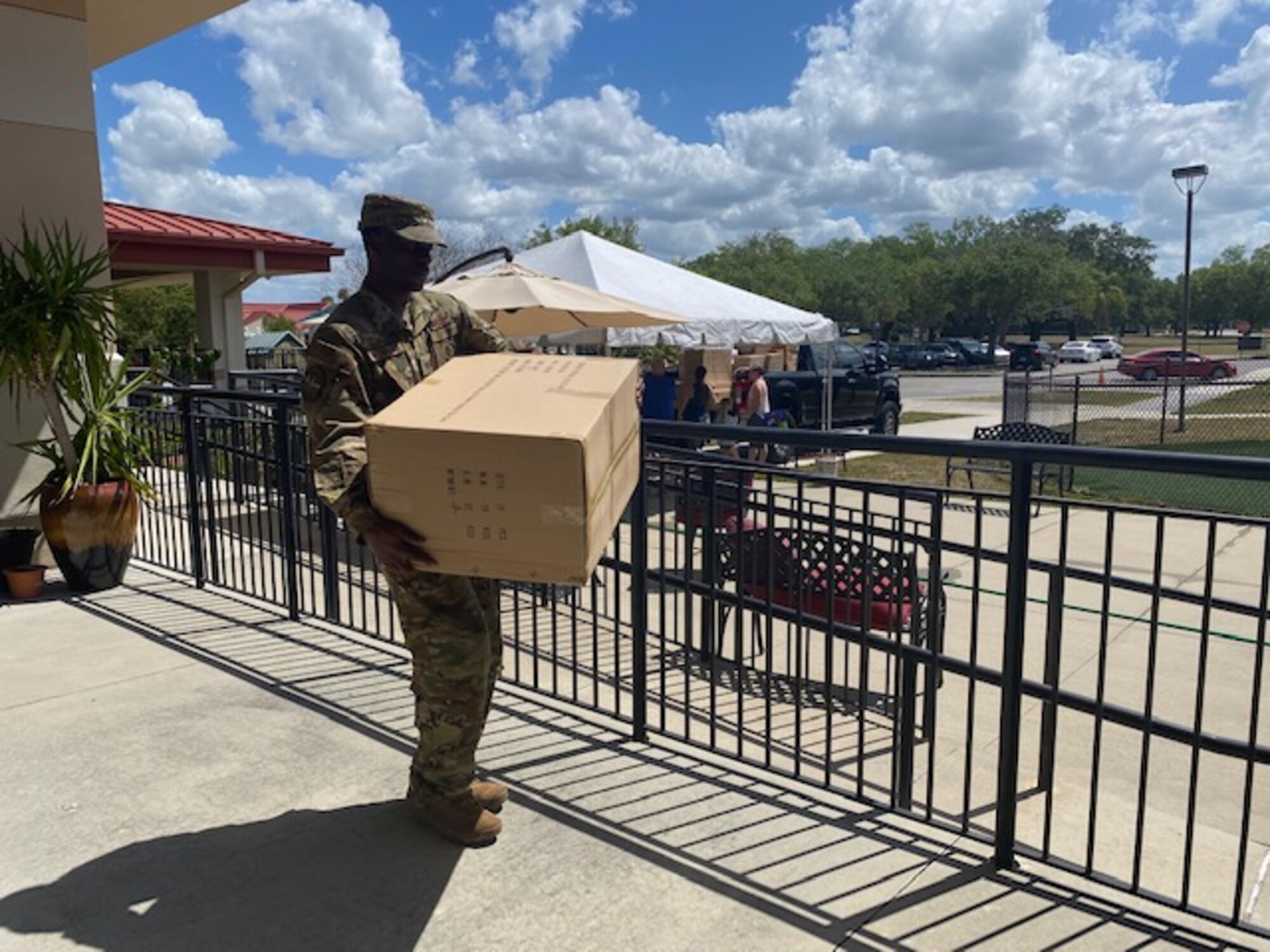 Staff Sgt. Dojaniee Hutchinson, 927 Air Refueling Wing Reserve Airmen passed along donated toys to children at the MacDill AFB Child Development Center in an attempt to spread some cheer in challenging times. (U.S. Air Force photo by Lt. Col. Lisa Ray)