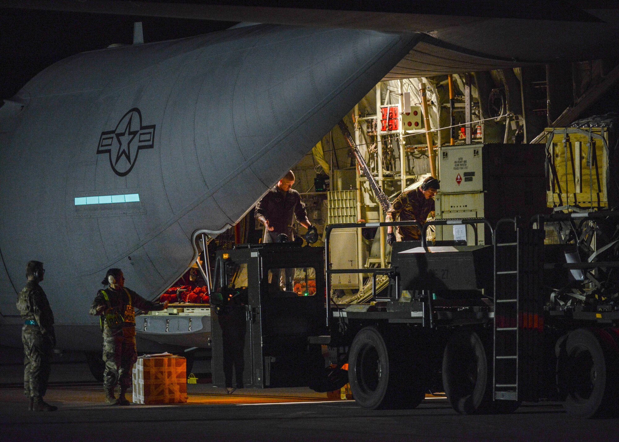 Military aircraft at night.