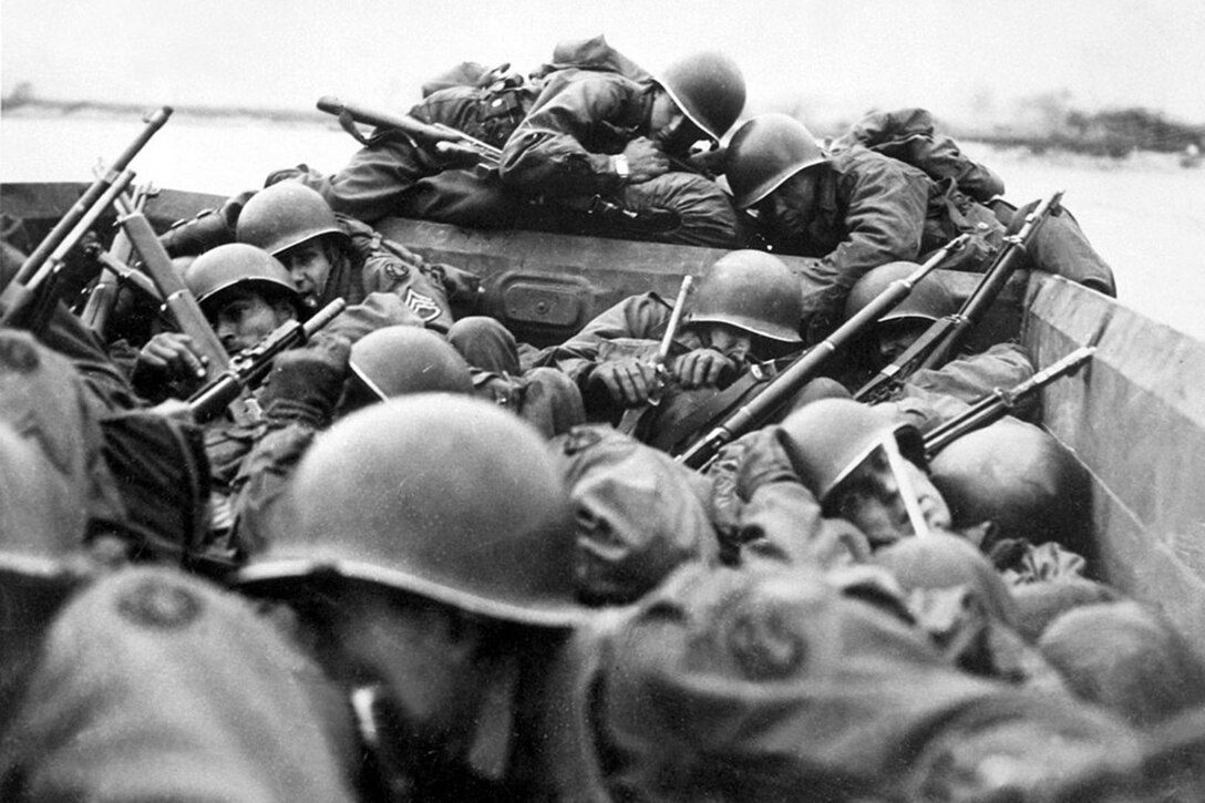 Troops in boats hunker down.