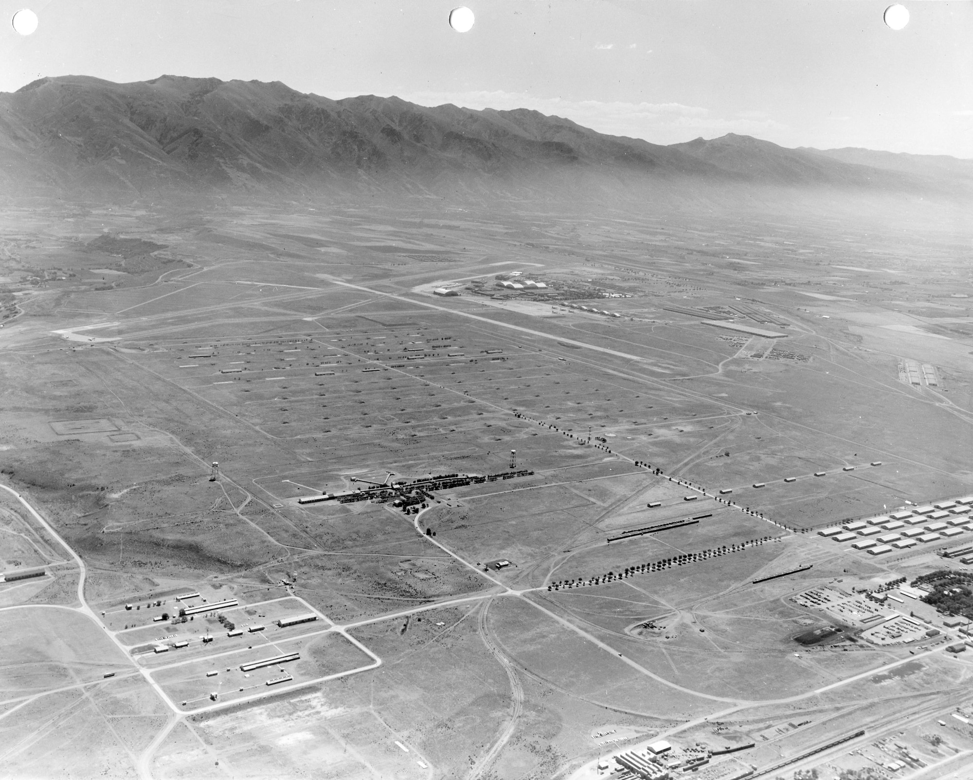 Aerial view, from the northwest looking southeast, of Hill AFB’s West Area (formerly Ogden Arsenal), around 1960.