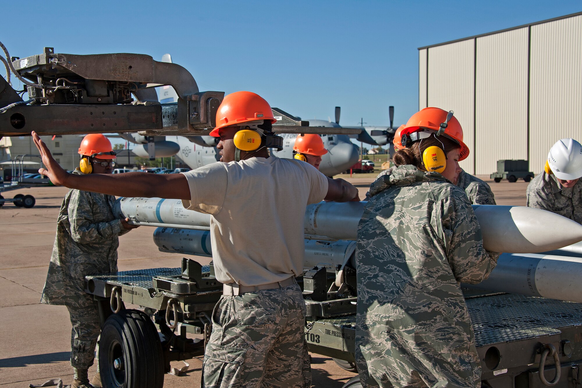 Airmen loading trailer