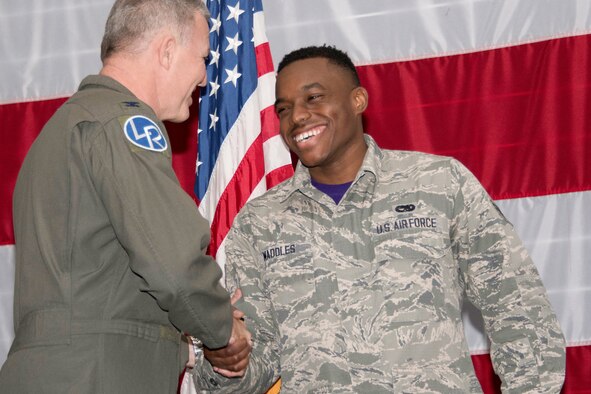 Photo of Airmen shaking hands