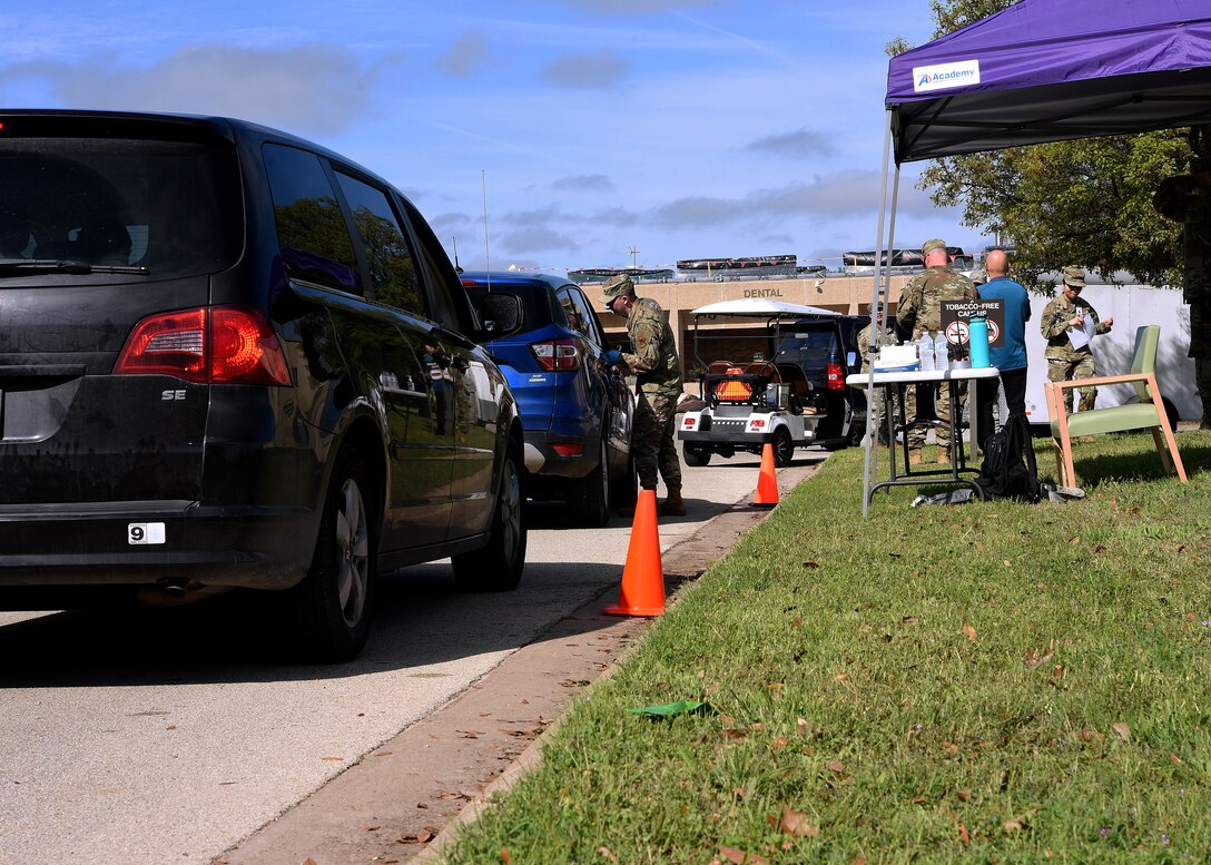 U.S. Air Force members of the 17th Medical Group active a drive-in pharmacy at the Ross Clinic on Goodfellow Air Force Base, Texas, March 23, 2020. With Goodfellow’s Health Protection Condition in BRAVO, the clinic is restricted to active duty members and patients seeing providers for the foreseeable future. Goodfellow currently has no confirmed COVID-19 cases.  (U.S. Air Force Photo by Airman 1st Class Abbey Rieves)