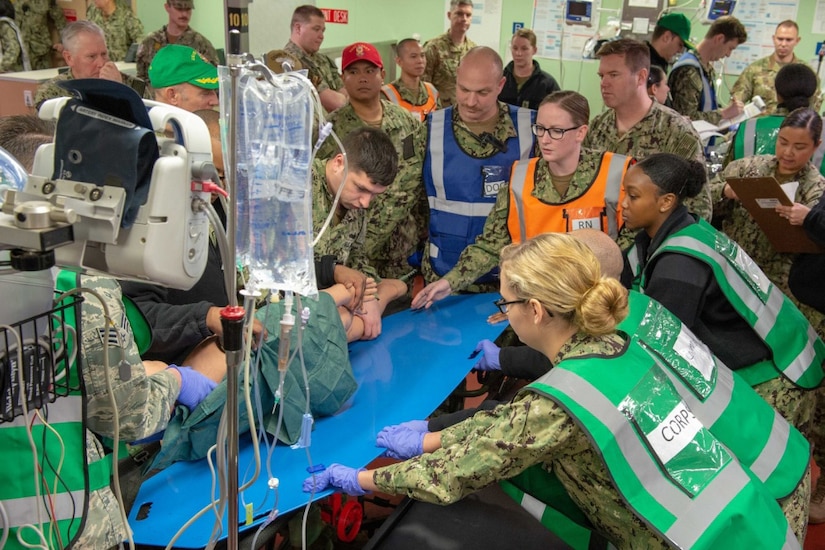 Hospital workers train on a ship.