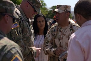 Colombian Army Col. Carlos Castro Pinzon, Combined Arms Task Force commander, right, and U.S. Army Col. Steven Barry, Joint Task Force-Bravo commander, discuss exercise operations at the opening ceremony for Exercise Vita at Fort Buenavista, Colombia, March 9, 2020. The ceremony formally marked the start of the exercise, which brings U.S. and Colombian forces together to perform humanitarian and civic-action operations. The exercise focuses on reinforcing longstanding ties and enhancing participants’ overall readiness while demonstrating U.S. Southern Command’s enduring promise to the Americas. (U.S. Air Force photo by Tech. Sgt. Daniel Owen)
