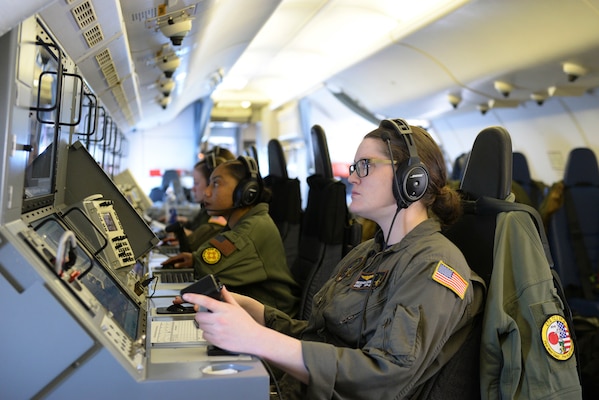 Navy Petty Officer 2nd Class Meghan Cooke and other sailors conduct flight operations aboard a squadron P-8A Poseidon aircraft during an intelligence, surveillance, and reconnaissance mission over the Eastern Mediterranean Sea, March 20, 2020.