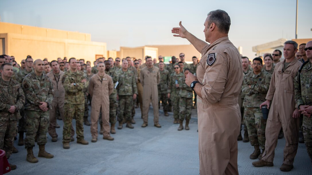 U.S. Air Force Lt. Gen. Joseph Guastella, U.S. Air Forces Central Command Commander, speaks with AFCENT Airmen outside of the combined air operations center at Al Udeid Air Base, Qatar, March 6, 2020.