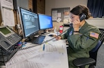 Tech. Sgt. Alex Morhead, with the West Virginia Air National Guard’s 167th Aeromedical Evacuation Squadron, answers a call at the West Virginia Poison Center in Charleston, West Virginia. From staffing phone banks to administering tests for COVID-19, many of the more than 9,000 National Guard members on duty throughout the country in response to COVID-19 are helping state and local medical professionals.