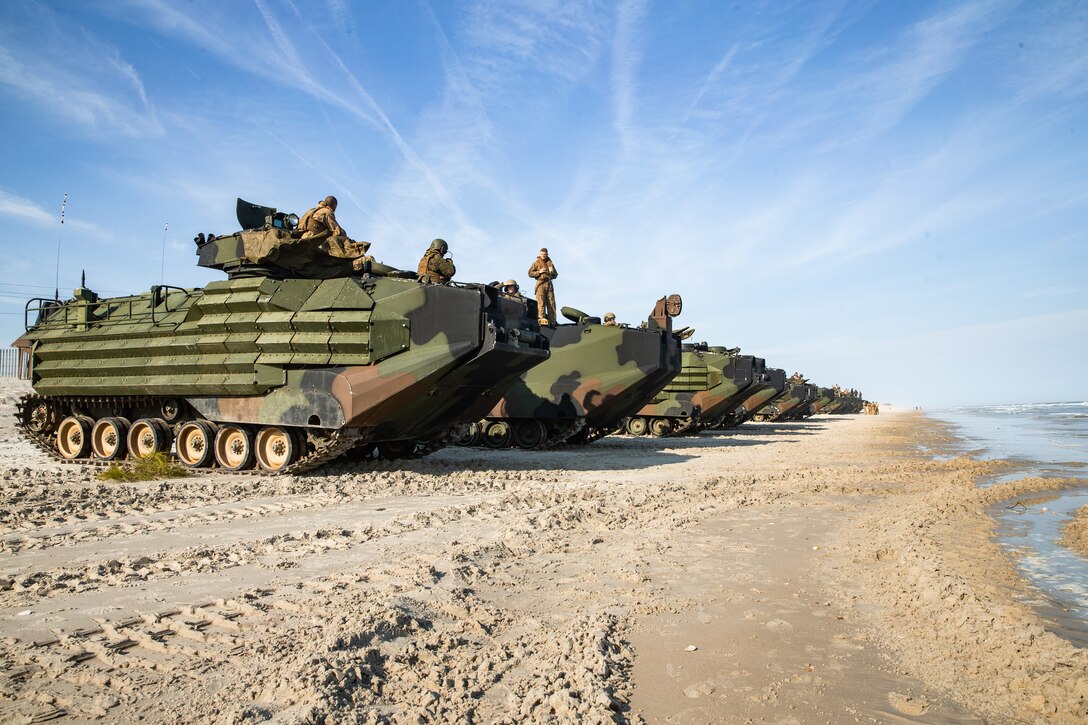 U.S. Marines with 3rd Platoon, Bravo Company, 2d Assault Amphibian Battalion stage their vehicles prior to conducting a ship-to-shore event at Camp Lejeune, N.C., March 19, 2020. The annual training requirement was used to maintain and improve the unit’s readiness and proficiency while conducting amphibious operations. (U.S. Marine Corps photo by Lance Cpl. Patrick King)