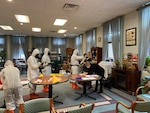 Members of the West Virginia National Guard's Chemical, Biological, Radiological, Nuclear and High Yield Explosive (CBRNE) Battalion and 35th Civil Support Team (CST) help test the staff of a nursing facility March 23, 2020, in Morgantown, West Virginia.