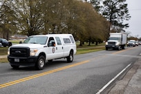 JOINT BASE LANGLEY-EUSTIS, Va. (March 23, 2020) A convoy of vehicles departs Joint Task Force Civil Support as part of a routine vehicle roll out.
